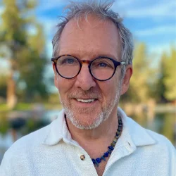 Howard Headshot-whote shirt beard glasses